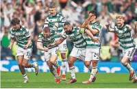  ?? ANDREW MILLIGAN/PA ?? Celtic players show their delight after winning the penalty shootout against Aberdeen