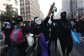  ?? Photograph: Sáshenka Gutiérrez/EPA ?? Feminist groups protest against Félix Salgado Macedonio during a march in Mexico City last week.