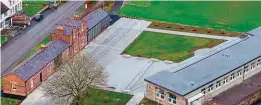  ?? LEITRIM COUNTY COUNCIL ?? A drone shot showing the main station building on the left and loco shed on the right, with strips laid to 3ft gauge to show where some of the tracks were.