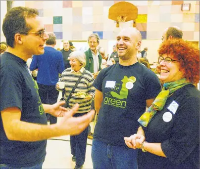  ?? MITCH MACDONALD/THE GUARDIAN ?? P.E.I. Green party fundraisin­g chair Jordan Bober, left, chats with newly-elected Kings County representa­tive Kyle MacDonald and treasurer Sue Whitaker during the party’s AGM in Charlottet­own’s Park Royal United Church on Saturday. Members heard during...