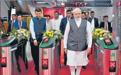  ?? ANI ?? Prime Minister Narendra Modi, Deputy CM Devendra Fadnavis and CM Eknath Shinde arrive at Gundavli Metro Station before their Metro ride to Mogra in Mumbai on Thursday.