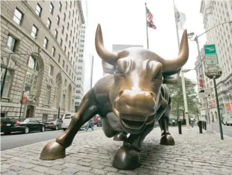  ?? AP FILES ?? Arturo Di Modica sculpted the bronze bull statue that has become an iconic symbol of Wall Street.