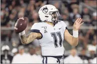  ?? Phelan M. Ebenhack / AP ?? UConn quarterbac­k Jack Zergiotis throws a pass during the first half against Central Florida in 2019.