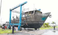  ??  ?? RECOVERED: The MV Dianne Bundaberg Port Marina. is raised at the