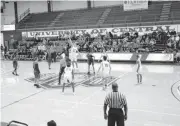  ?? [PHOTO BY SARAH PHIPPS, THE OKLAHOMAN] ?? Edmond Memorial and Moore tip off Tuesday at UCO.