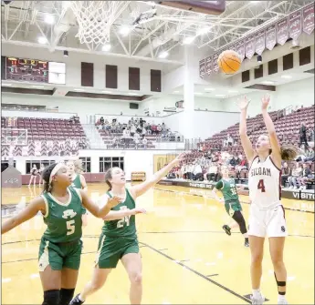  ?? Mark Ross/Special to the Herald-Leader ?? Siloam Springs junior Emily Keehn goes in for a short field goal attempt during the Lady Panthers’ 56-31 win against Alma on Tuesday, Jan. 19, at Panther Activity Center. Keehn scored a career-high 21 points in the win.