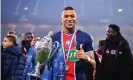  ??  ?? Kylian Mbappé holds the French Cup trophy after powering PSG to victory over Monaco. Photograph: Franck Fife/AFP/Getty