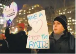  ?? SPENCER PLATT/GETTY IMAGES ?? Valentine’s Day protest: Marchers who oppose President Trump’s recent immigratio­n raids gathered in New York and other cities on Tuesday.