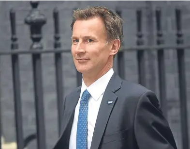  ?? Picture: PA. ?? Cabinet minister Jeremy Hunt sought to play down reports of splits within Mrs May’s top team.