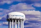  ?? CARLOS OSORIO/ASSOCIATED PRESS ?? Several former officials have been told they are being charged after a new investigat­ion of the water scandal in Flint, Mich.