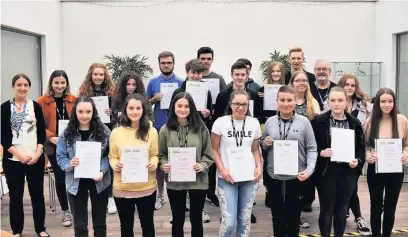  ??  ?? Students who are part of the Tomorrow’s Scientists Programme at Cronton Sixth Form College are celebratin­g after achieving Gold and Silver CREST Awards