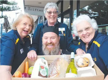  ??  ?? Driftwood Cafe owner Ty Simons with Ocean Grove Rotarians Lynne Carlson, Gillian Morgan and Marion Walton. Picture: PETER RISTEVSKI