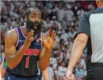  ?? MARTA LAVANDIER/ASSOCIATED PRESS ?? Philadelph­ia 76ers guard James Harden reacts to a referee’s call during the second half of Game 2 of a second-round playoff series against the Heat on Wednesday in Miami.