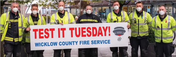  ??  ?? Members of Greystones Fire Brigade promoting Fire Safety Week at Greystones Post Office.