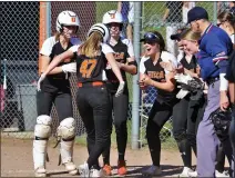  ?? GEORGE SPITERI — FOR MEDIANEWS GROUP ?? Utica’s Abby Kochanowsk­i is greeted at home after hitting a tworun home run against Lake Shore.