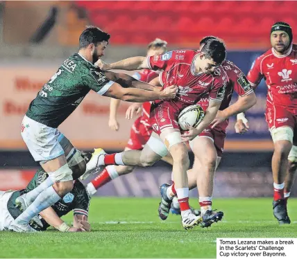  ?? ?? Tomas Lezana makes a break in the Scarlets’ Challenge Cup victory over Bayonne.