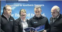  ?? PHOTO: BLUE SKY MEATS ?? In a better place . . . Blue Sky Meats general manager of operations Ross Smith (left), chief financial officer Jess Vickery, chief executive Todd Grave and engineerin­g manager Gavin Tippet (right) look over the company’s 2018 annual report.