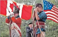  ?? TORSTAR FILE PHOTO ?? Heads are bow in a moment of silence to recall those who died in the Battle of Chippawa at a commemorat­ive service in 2016.