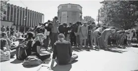  ?? ?? Iman Samer Altabaa leads a funeral prayer for those killed in Gaza during a pro-Palestine student protest Friday at Texas Tech University in Lubbock.