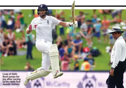  ??  ?? Leap of faith: Root jumps for joy after racing to his ninth Test match century