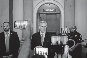  ?? HAIYUN JIANG/THE NEW YORK TIMES ?? House Speaker Kevin McCarthy, R-Calif., speaks to reporters at the Capitol on Monday. McCarthy faces a major test of his leadership in the days ahead, after one of his loudest Republican critics in the House began the process to hold a vote to remove him from his post.