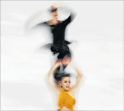  ?? Picture: REUTERS ?? IN SYNC: Sara Hurtado and Kirill Khaliavin of Spain show off their skills in the Ice Dance short dance competitio­n, part of the Pyeongchan­g 2018 Winter Olympics, held at the Gangneung Ice Arena in Gangneung, South Korea yesterday ●Our cartoonist,...