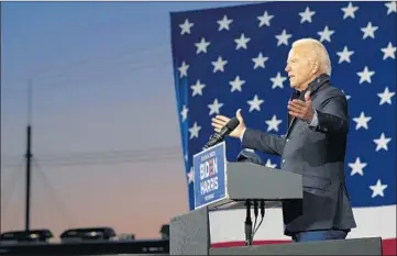  ?? RUTH FREMSON/THE NEW YORK TIMES ?? Trump allies have promoted claims of corruption aimed at Joe Biden’s son Hunter. Above, Joe Biden on Oct. 16 in Detroit.