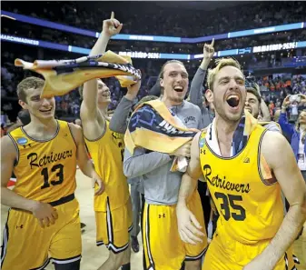  ?? STREETER LECKA/GETTY IMAGES ?? UMBC became the first No. 16 seed to knock off a No. 1 when it beat Virginia in 2018.