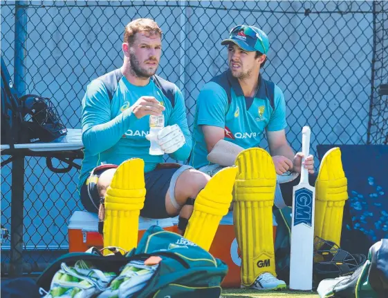  ?? Picture: AAP IMAGE ?? Aaron Finch (left) and Travis Head at training yesterday at the Gabba ahead of the second ODI against England.