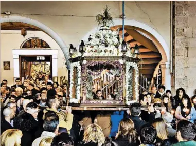  ?? RICK STEVES/RICK STEVES’ EUROPE PHOTOS ?? In Nafplio, Greece, a symbolic Easter casket is carried in a funeral procession that winds through the town.