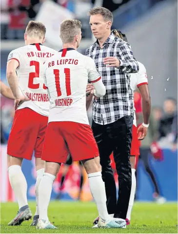  ?? AFP ?? Leipzig coach Julian Nagelsmann, right, talks with forward Timo Werner after a game this season.