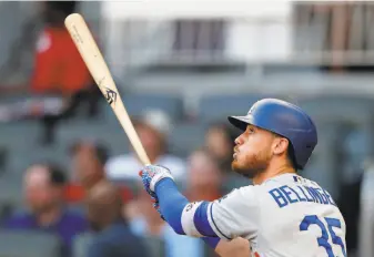  ?? John Bazemore / Associated Press ?? Above: The Dodgers’ Cody Bellinger had 47 homers with a .305 average, 115 RBIs and a 1.035 OPS. Below: The Angels’ Mike Trout, the 11th threetime MVP, hit a careerhigh 45 homers.