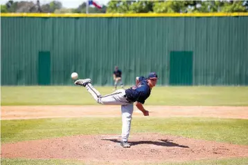  ?? Staff photo by Joshua Boucher ?? n Texas A&M University-Texarkana pitcher Jacob Cobb-Adams throws a pitch against University of Houston-Victoria on Saturday during the first game of their doublehead­er in Texarkana, Texas.