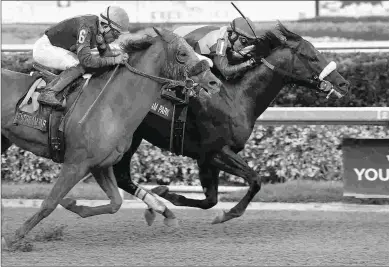  ?? LESLIE MARTIN/COGLIANESE PHOTOS ?? Unified beats Mind Your Biscuits in the Grade 3 Gulfstream Sprint Championsh­ip in February.