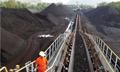  ?? Photograph: Bloomberg/Getty Images ?? Open pit coal mine, Indonesia. HSBC states that it plans to end coal financing across the world by 2040.