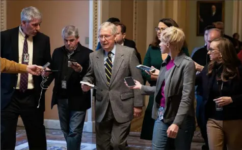  ?? Tasos Katopodis/Getty Images ?? Senate Majority Leader Mitch McConnell, R-Ky., walks to his office from the Senate chamber at the U.S. Capitol on Friday in Washington.