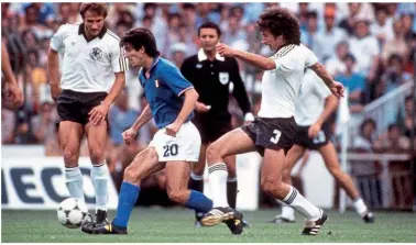  ??  ?? Clash…Rossi holds off Paul Breitner during the 1982 World Cup final