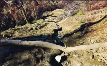  ?? COURTESY BY CAL FIRE ?? Erosion on a dirt road off Empire Grade Road near Ben Lomond is seen on Nov. 19, following work by PG&E crews after the CZU Lightning fire.