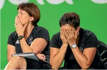  ?? PHOTOSPORT ?? Janine Southby, left, and Yvette Mccausland­durie show the strain of the Silver Ferns’ disappoint­ing campaign at the Commonweal­th Games.
