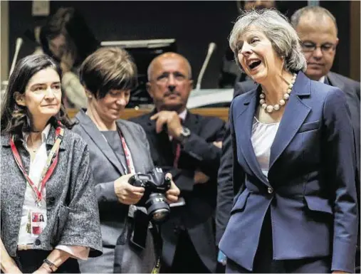  ??  ?? TOUGH TASK: British Prime Minister Theresa May arrives for a round table meeting during an EU summit in Brussels yesterday