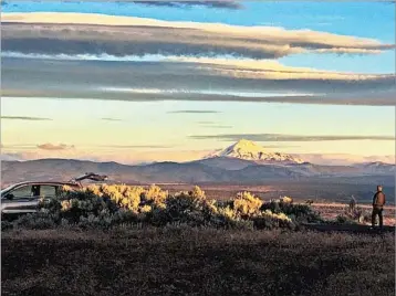  ?? GILLIAN FLACCUS/AP PHOTOS ?? The first place to experience total darkness as the moon passes between the sun and the Earth will be in Oregon, and Madras, in the central part of the state, is expected to be a prime viewing location. Up to a million people are expected.