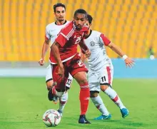  ?? Courtesy: UAE FA twitter ?? UAE’s Ali Al Salmeen bursts past Yemen’s Abdul Wasea Al Matari and Alaa Mahdi during the UAE’s 2-0 friendly win at Al Wasl on Tuesday.