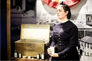  ?? STAFF PHOTO BY C.B. SCHMELTER ?? The permanent Dr. Mary Walker exhibit is seen at the Charles H. Coolidge National Medal of Honor Heritage Center on Thursday in Chattanoog­a. A new, temporary exhibit featuring Walker’s Medal of Honor will be displayed until October.