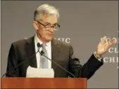  ?? CHARLES REX ARBOGAST — THE ASSOCIATED PRESS ?? Federal Reserve Chairman Jerome Powell speaks before the Economic Club of Chicago on Friday.