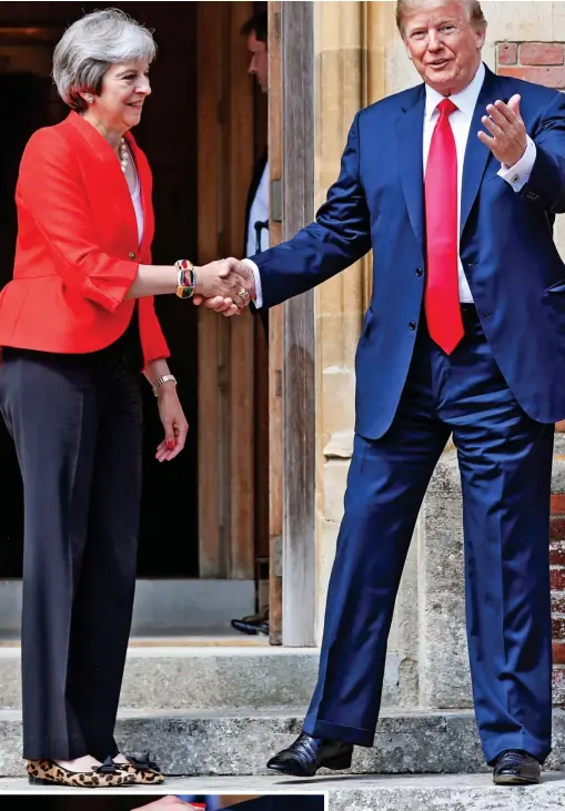  ??  ?? Firm friends? The two leaders at Chequers yesterday. Inset, the President gives one of his infamous white-knuckle handshakes