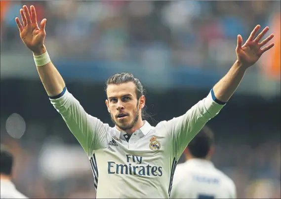  ?? FOTO: SIRVENT ?? Bale volvió a jugar tras tres meses lesionado y tardó sólo 13 minutos en marcar el tanto que sellaba el triunfo del Real Madrid ante el Espanyol