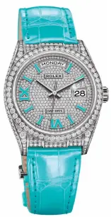  ??  ?? Oyster Perpetual Day-Date 36 in 18 ct white gold and diamonds with a turquoise leather strap and
matching appliques