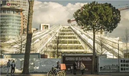  ?? SERGEY PONOMAREV/THE NEW YORK TIMES ?? The pyramid in Tirana, Albania, long a reminder of a brutal regime, now symbolizes a city desiring to be a tech mecca.