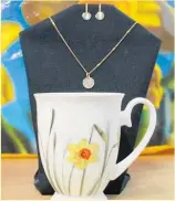  ?? ?? The necklaces have matching earrings.
The cup and jewellery are some of the items to be excited about, says Raewyn.