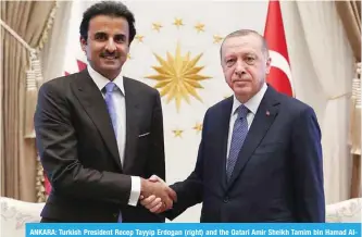  ?? — AFP ?? ANKARA: Turkish President Recep Tayyip Erdogan (right) and the Qatari Amir Sheikh Tamim bin Hamad AlThani shake hands prior to talks yesterday.